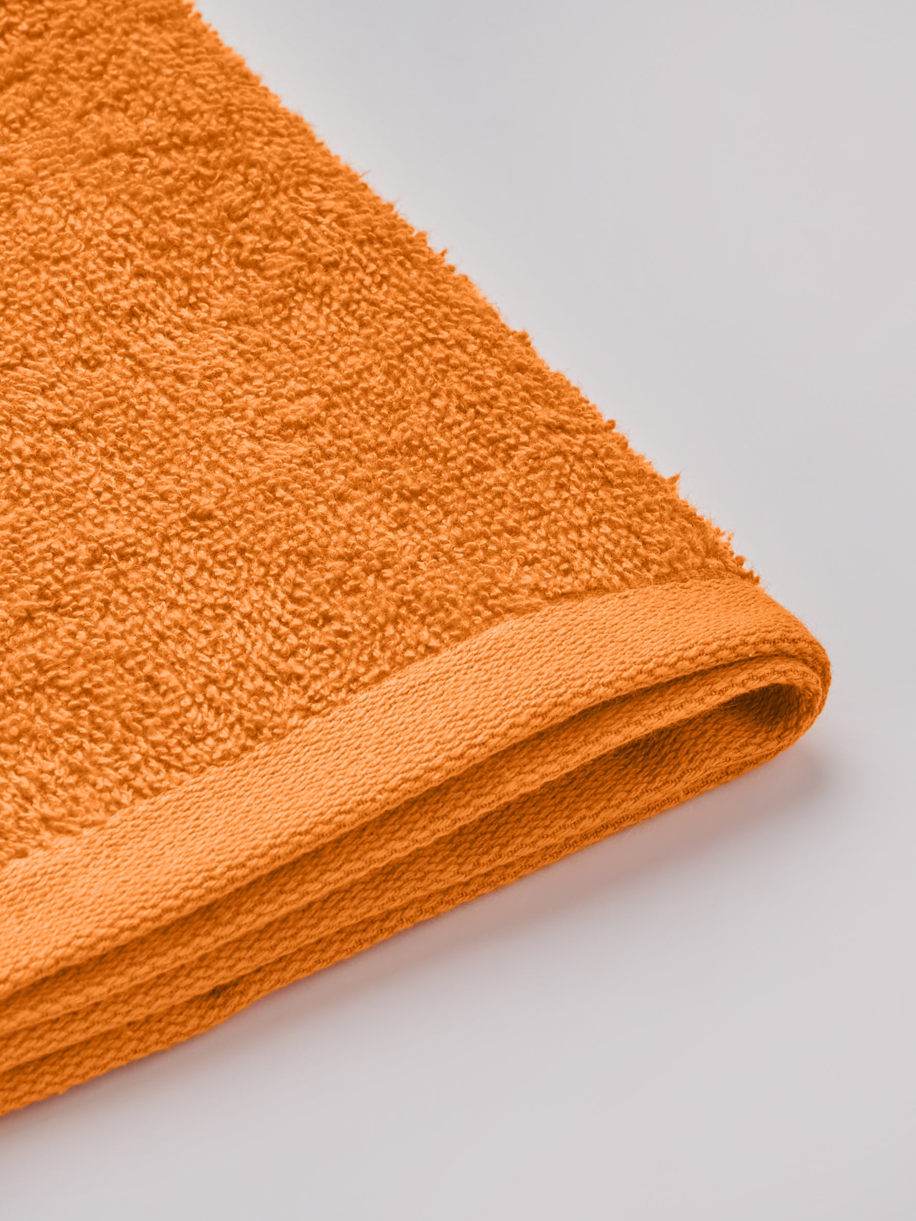 The Elite Collection | Face Towel | 450 GSM Pack of 4 | Tangy Orange
